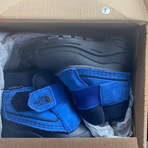 Baby boots North Face Never worn brand new size 4